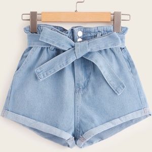 High waisted denim shorts with belt.
